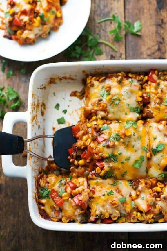 A healthy Mexican casserole featuring roasted corn and peppers, offering a flavorful and wholesome vegetarian dinner option.