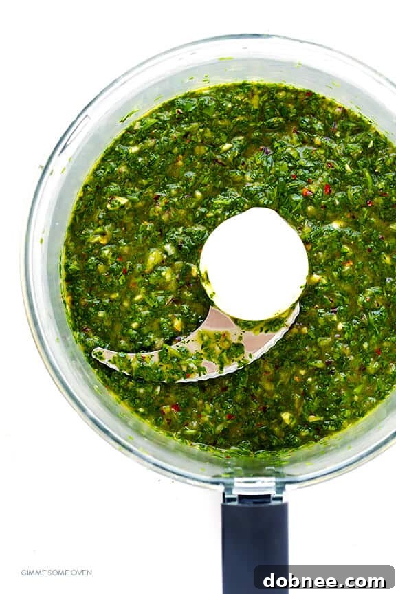 Close-up of Chimichurri Shrimp, highlighting the glossy green sauce clinging to plump, juicy shrimp.