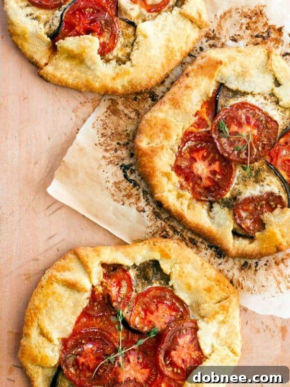Heirloom Tomato and Eggplant Galette - a rustic and savory tart perfect for a light meal.
