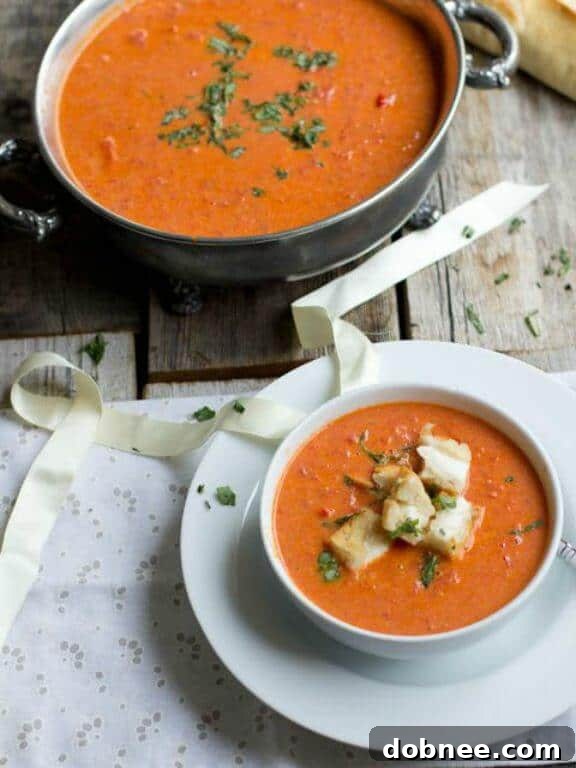 Roasted Tomato Basil Soup with Mini Grilled Cheese "Croutons" - a comforting and hearty soup.