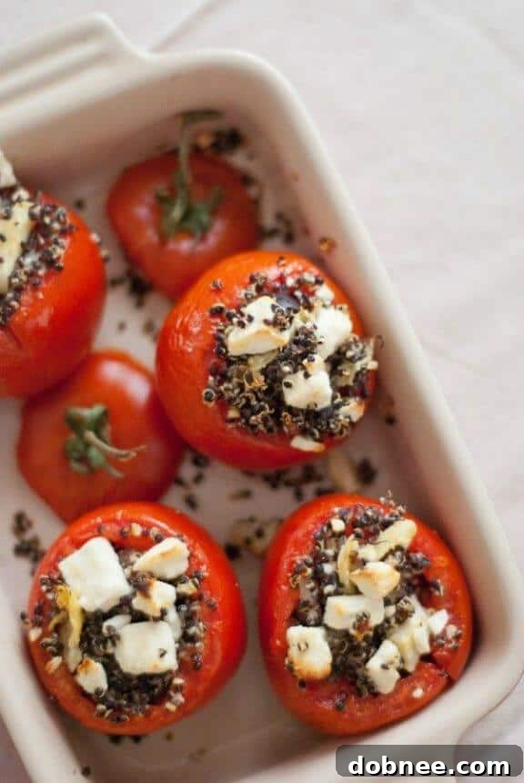 Mediterranean Stuffed Tomatoes with Quinoa - a healthy and flavorful vegetarian main course.