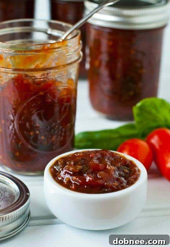 Homemade Tomato Jam - a sweet and savory spread for toast, cheese, or meats.