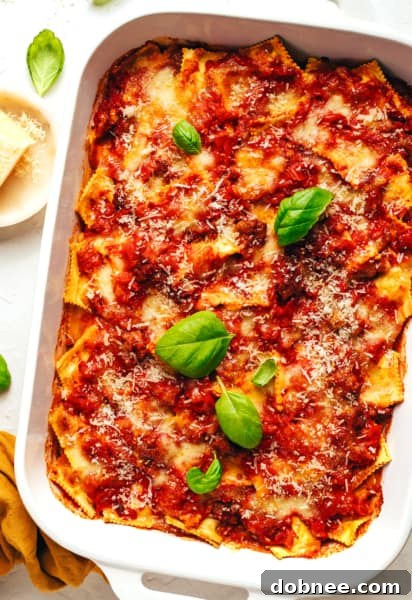 Close-up of baked ravioli lasagna with bubbly cheese