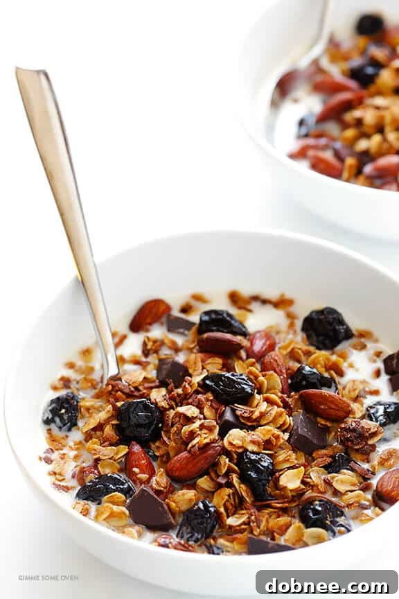 Freshly baked granola cooling on a baking sheet, ready for the next steps.