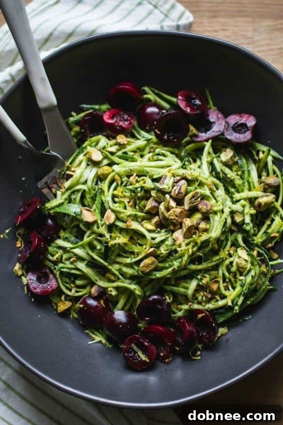 Pistachio Kale Pesto with Zucchini Noodles + Cherries | edibleperspective.com