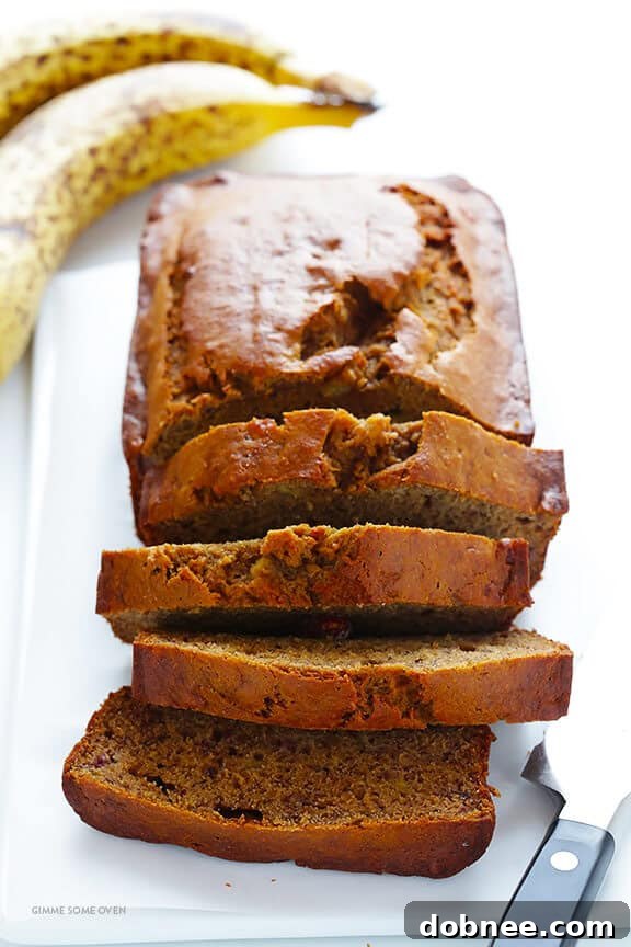 The ultimate moist and healthy banana bread recipe, naturally sweetened with maple syrup and made with white whole wheat flour. So easy to make and incredibly delicious!