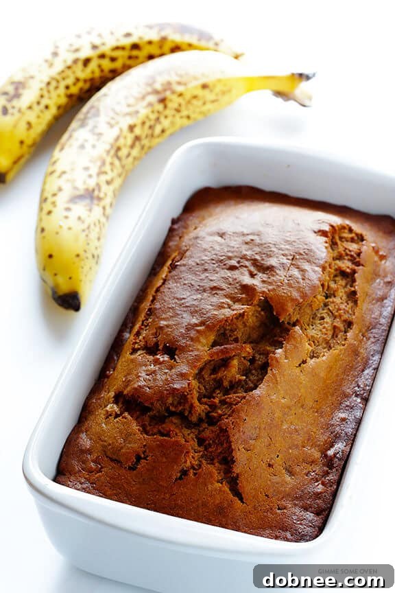 The ultimate banana bread, made healthier with maple syrup and white whole wheat flour, delivers an incredibly moist and rich flavor profile.