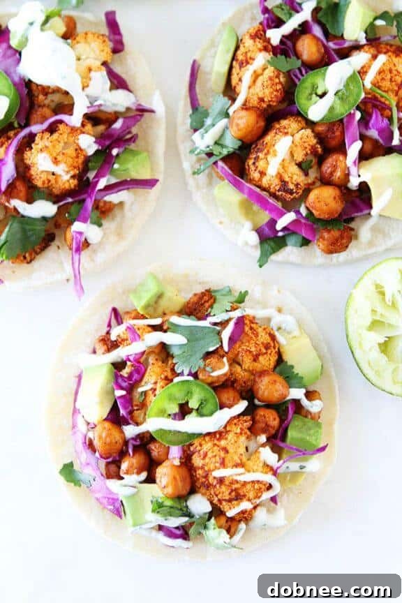Roasted Cauliflower and Chickpea Tacos | twopeasandtheirpod.com