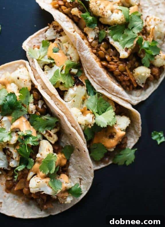 Roasted Cauliflower and Lentil Tacos with Creamy Chipotle Sauce | cookieandkate.com