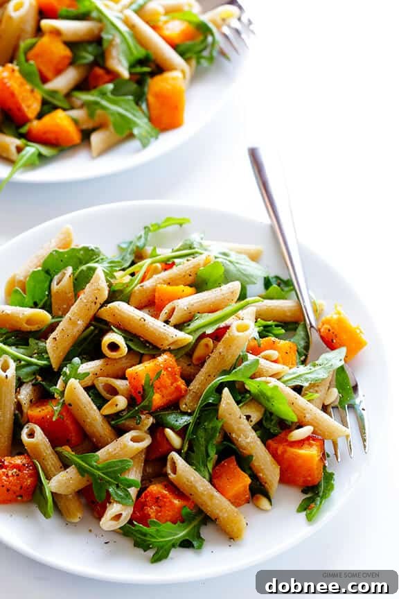 Close-up of 5-Ingredient Butternut Squash, Arugula and Goat Cheese Pasta with creamy sauce | gimmesomeoven.com