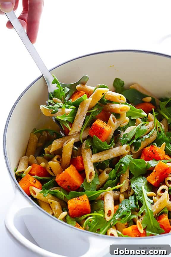 Plate of 5-Ingredient Butternut Squash, Arugula and Goat Cheese Pasta, ready to serve | gimmesomeoven.com