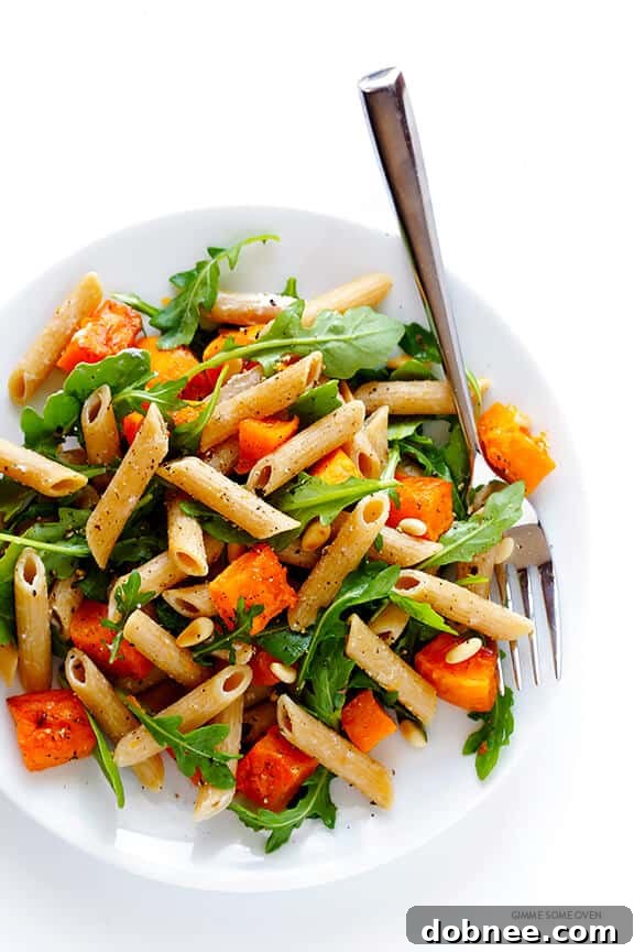 Overhead shot of 5-Ingredient Butternut Squash, Arugula and Goat Cheese Pasta with vibrant colors | gimmesomeoven.com