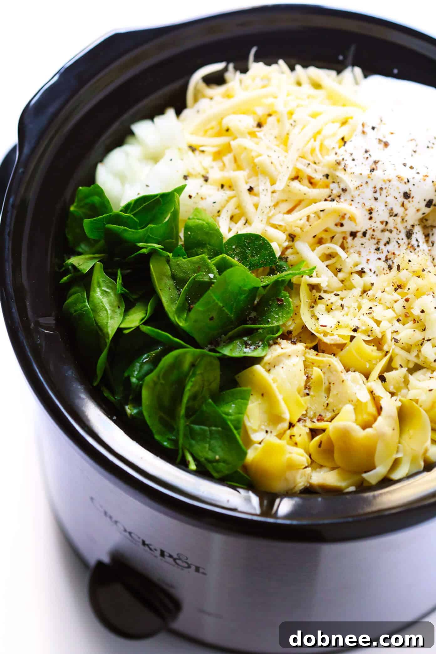 Crockpot Spinach Artichoke Dip Recipe - A close-up of the rich, creamy texture, ready for dipping.