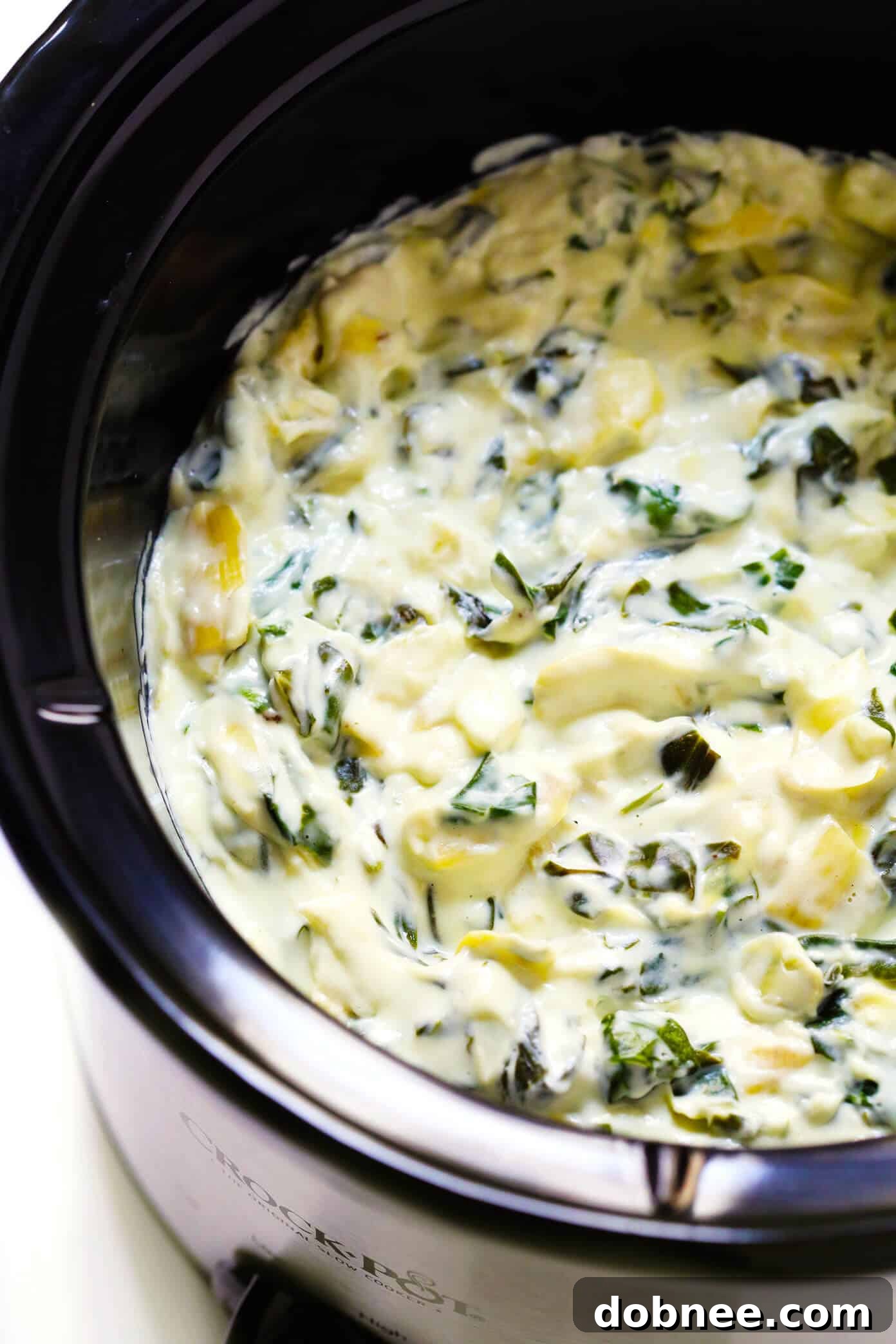 Hot Spinach Artichoke Dip Recipe - Served warm with a variety of crispy dippers.