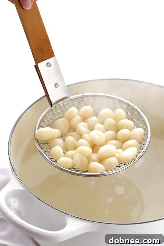 Gnocchi with Brussels Sprouts, Chicken Sausage and Kale Pesto -- quick and easy to make and SO flavorful! | dobnee.com