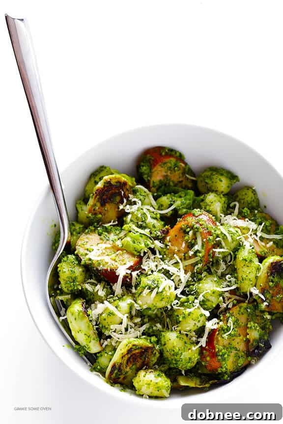 Gnocchi with Brussels Sprouts, Chicken Sausage and Kale Pesto -- quick and easy to make and SO flavorful! | dobnee.com