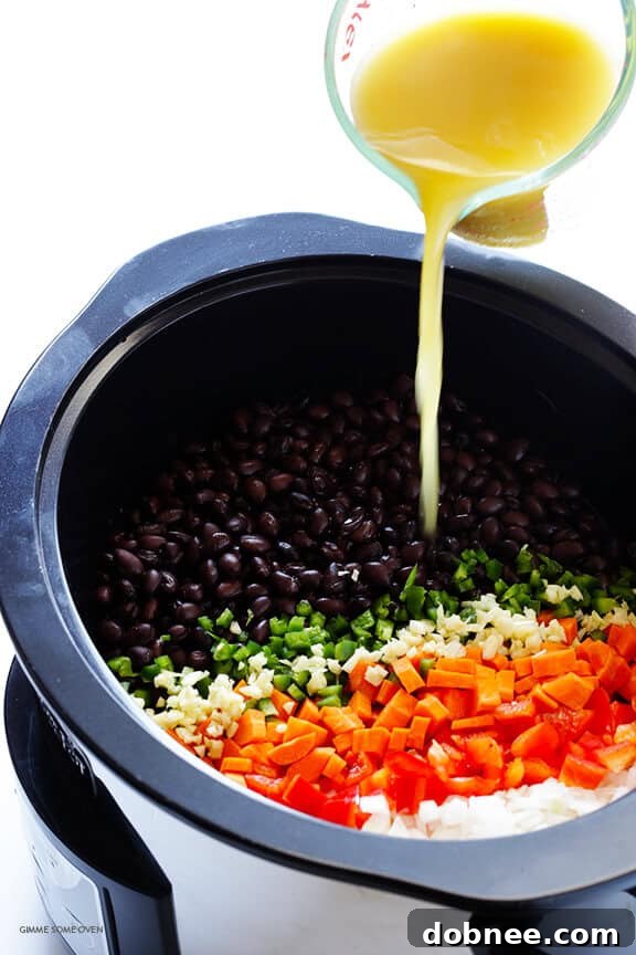 Slow Cooker Black Bean Soup -- let your crock pot do the work with this delicious vegetarian soup | gimmesomeoven.com