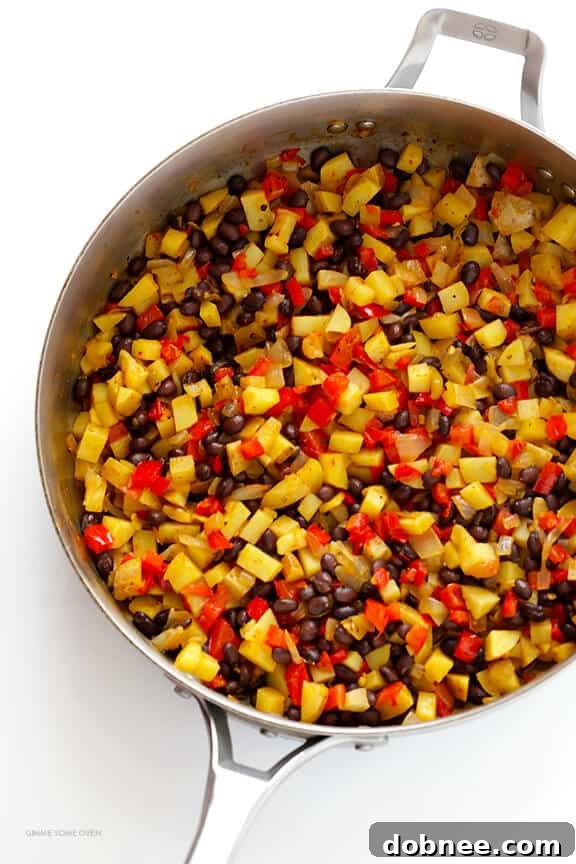 Close-up of a freezer breakfast burrito, showing the tortilla folded and ready for wrapping. A perfect example of easy breakfast meal prep.