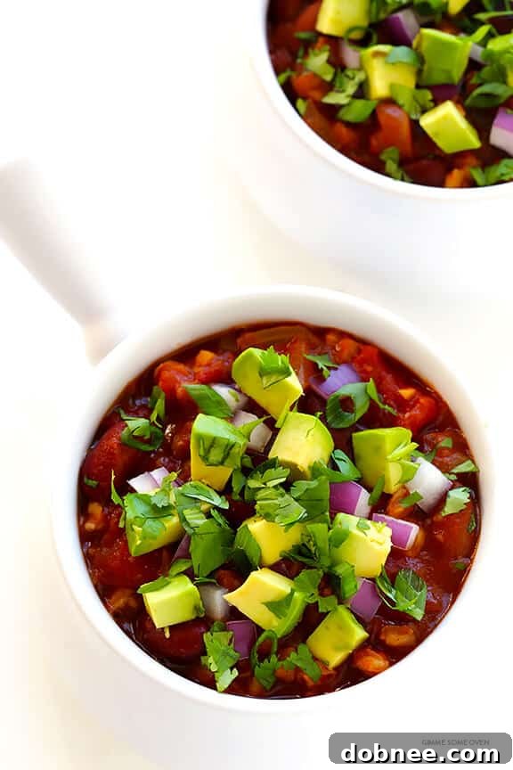 Slow Cooker Vegetarian Chili Recipe -- easy to make in the crock pot or on the stovetop, naturally gluten-free and vegan, and SO delicious! | dobnee.com