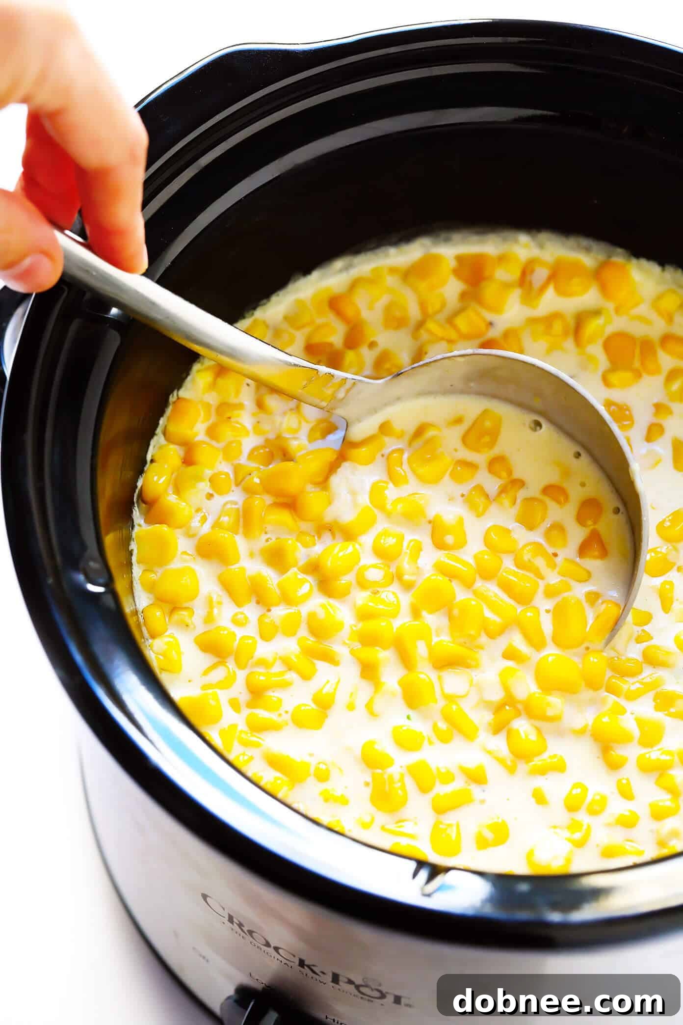 Rich and creamy slow cooker creamed corn in a bowl