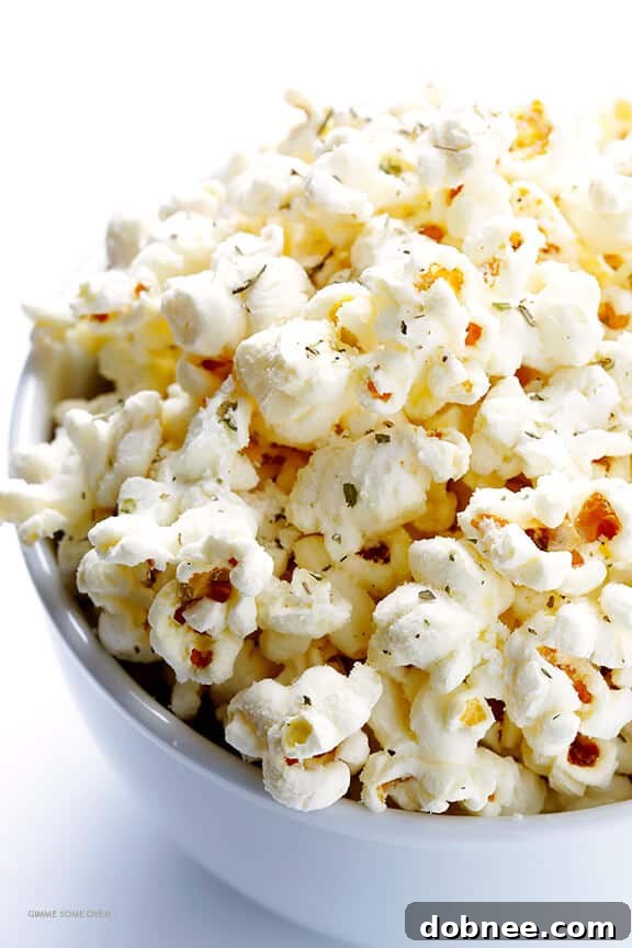 Olive Oil and Parmesan Popcorn -- easy to make with just a few ingredients, and so irresistibly good! | gimmesomeoven.com