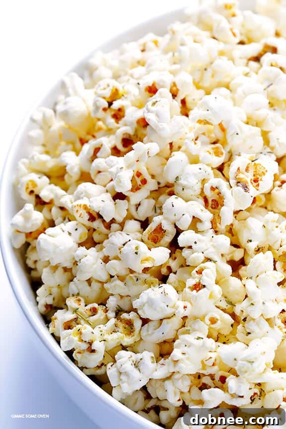 Olive Oil and Parmesan Popcorn -- easy to make with just a few ingredients, and so irresistibly good! | gimmesomeoven.com