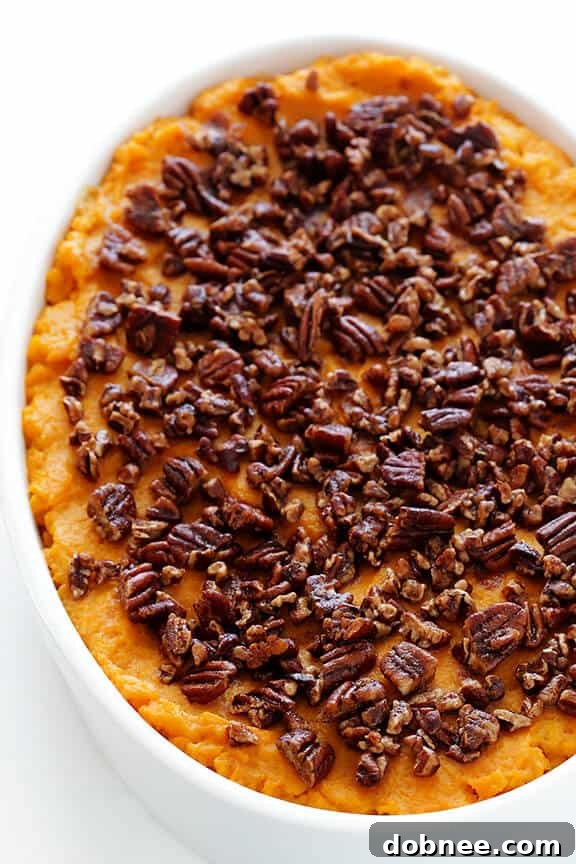Candied Yam Perfection 2 Healthier Sweet Potato Casserole -- naturally sweetened with a hint of maple syrup, and topped with cinnamon pecans | gimmesomeoven.com