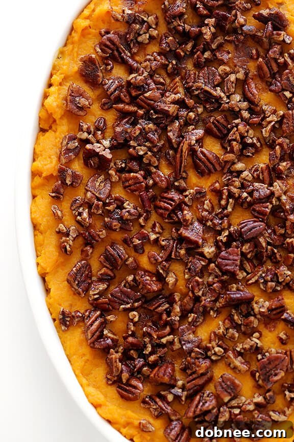 Candied Yam Perfection 3 Healthier Sweet Potato Casserole -- naturally sweetened with a hint of maple syrup, and topped with cinnamon pecans | gimmesomeoven.com