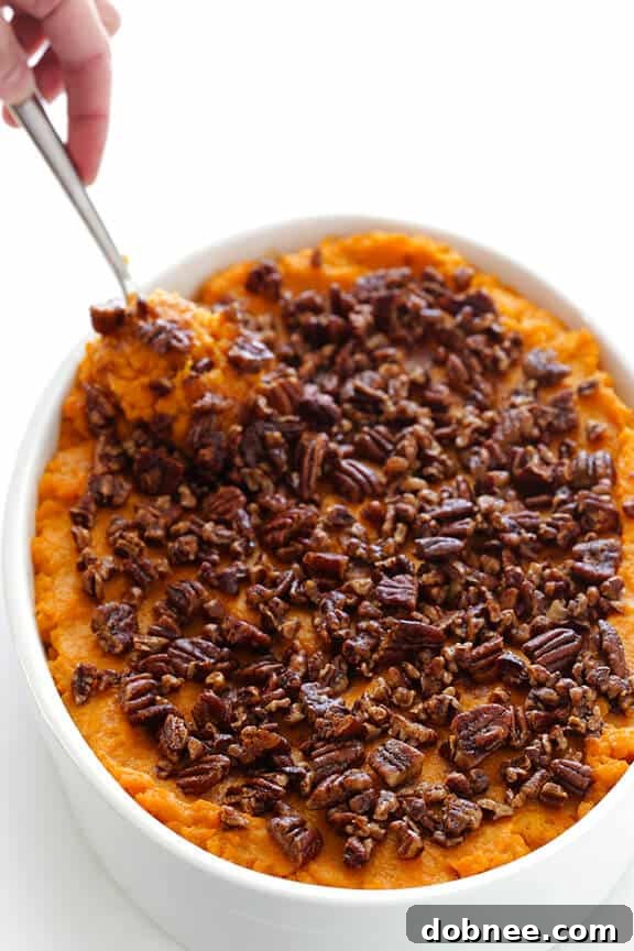 Candied Yam Perfection 4 Healthier Sweet Potato Casserole -- naturally sweetened with a hint of maple syrup, and topped with cinnamon pecans | gimmesomeoven.com