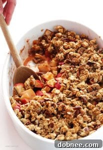 Easy Apple Crisp recipe from GimmeSomeOven, a delightful and simple gluten-free dessert.