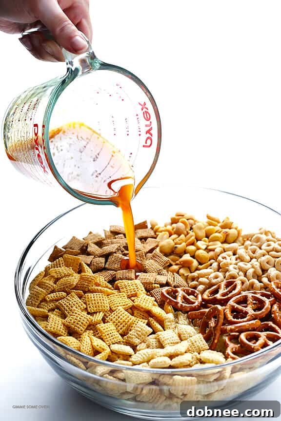Adding favorite mix-ins like pretzels, peanuts, and Cheerios to Chex Mix.