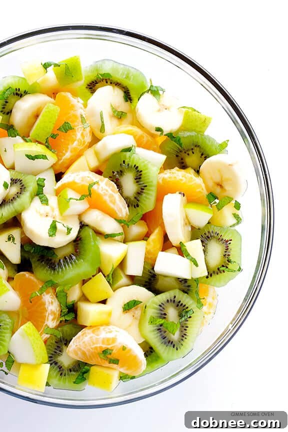 Honey Lime Mint Dressing poured over Winter Fruit Salad