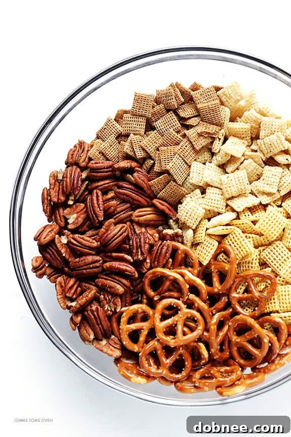 Praline Pecan Party Chex 3 Candied Pecan Chex Mix -- traditional party mix tossed with pecans and a candied coating. So easy to make, and SO GOOD! | gimmesomeoven.com