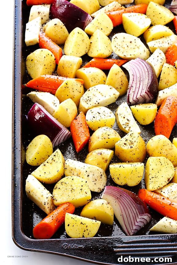 Assortment of vibrant roasted root vegetables with herbs