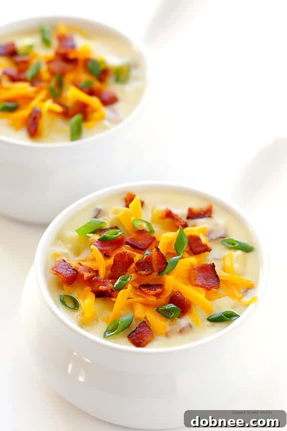 A large, inviting pot of finished Slow Cooker Potato Soup, rich and creamy, ready for serving