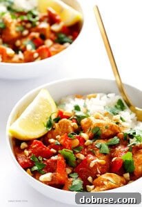 Creamy Cashew Chicken Curry, ready in 30 minutes, served over rice with fresh cilantro.