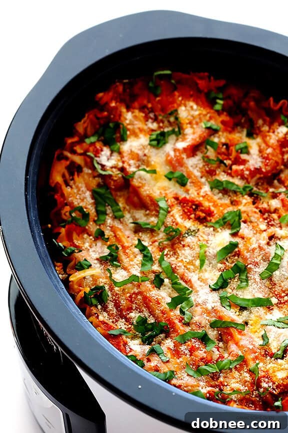 This Slow Cooker Lasagna recipe is easy to make in the crock pot, it takes just minutes to prep, and you can customize it with all of your favorite ingredients. A perfect, comforting meal for busy weeknights.