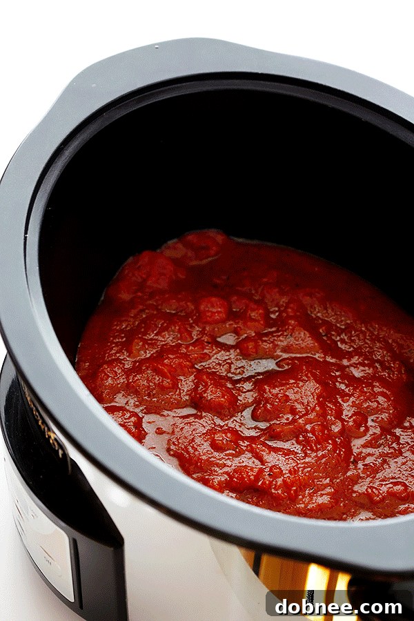 This Slow Cooker Lasagna recipe is easy to make in the crock pot, it takes just minutes to prep, and you can customize it with all of your favorite ingredients. A delicious and versatile meal.