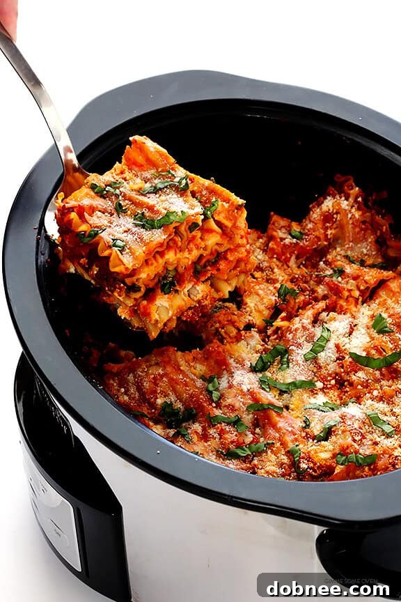 This Slow Cooker Lasagna recipe is easy to make in the crock pot, it takes just minutes to prep, and you can customize it with all of your favorite ingredients. Perfect for a busy family or entertaining.