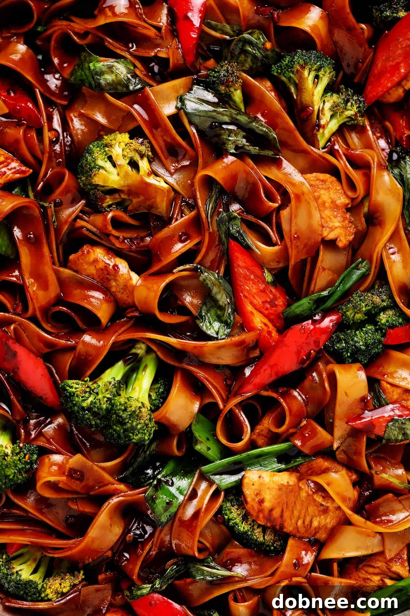 Drunken Noodles (Pad Kee Mao) Closeup with Broccoli and Red Bell Pepper