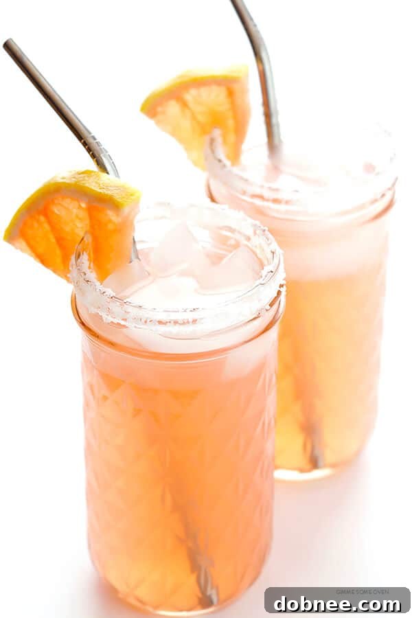 All ingredients mixed in a cocktail shaker with ice, ready to be shaken and poured