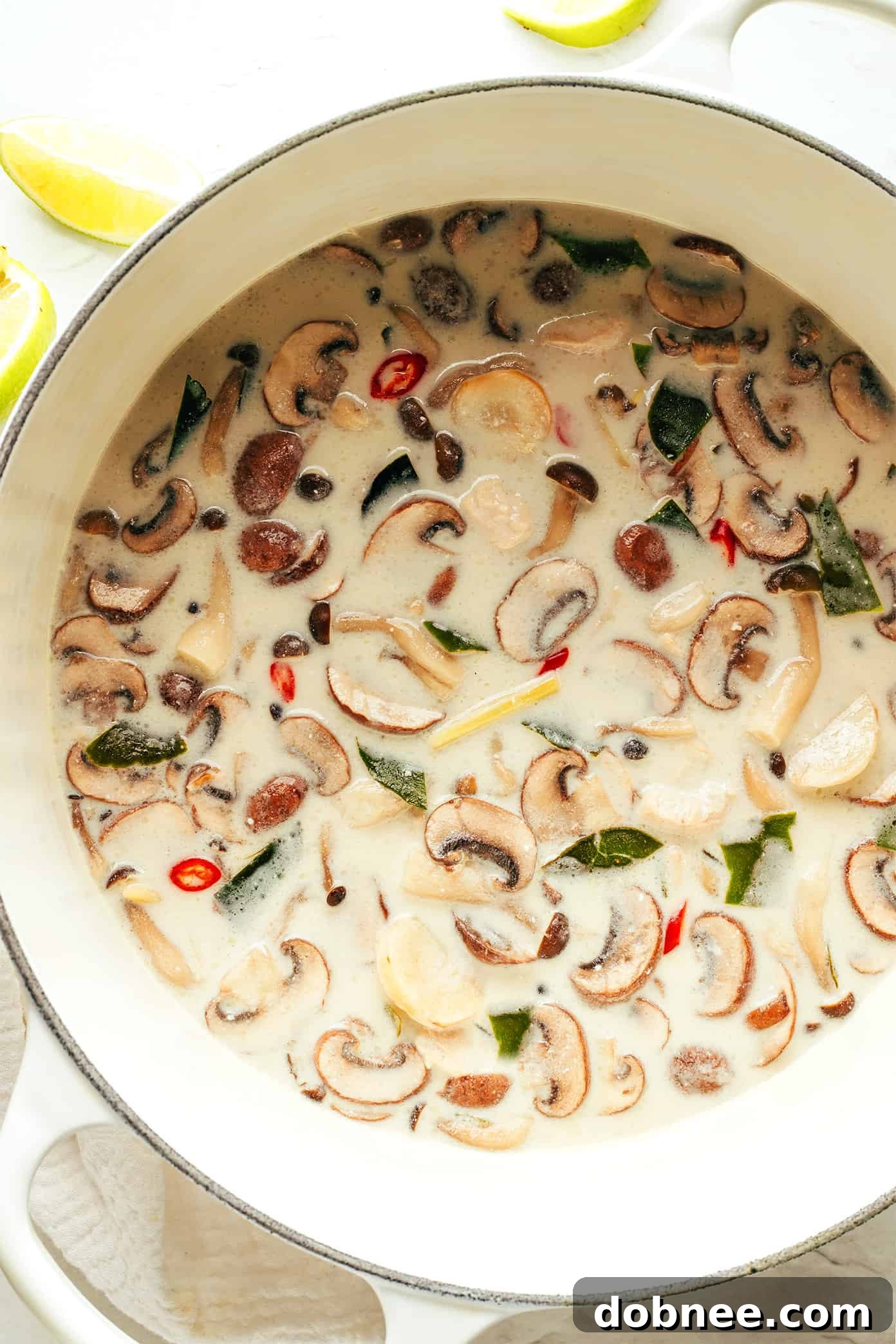 Large pot of bubbling Tom Kha Gai soup, ready to serve