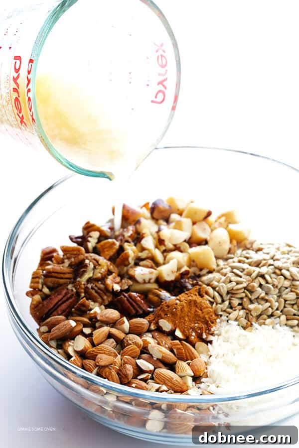 Mixing the nuts, seeds, and coconut for grain-free granola