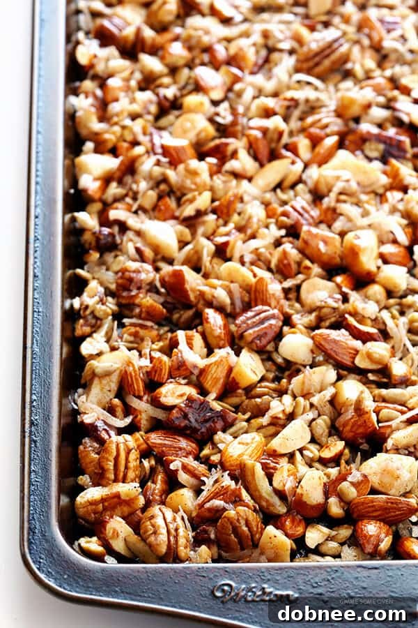 Grain-free granola spread evenly on a baking sheet