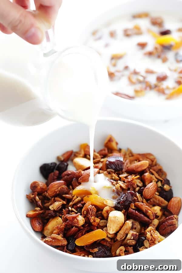 Freshly baked grain-free granola cooling on a baking sheet