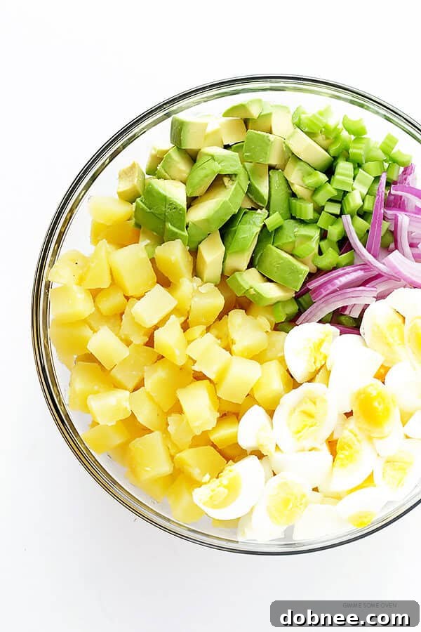 Avocado Potato Salad -- a lighter, creamier, and incredibly flavorful side dish featuring fresh avocados and Greek yogurt. | dobnee.com
