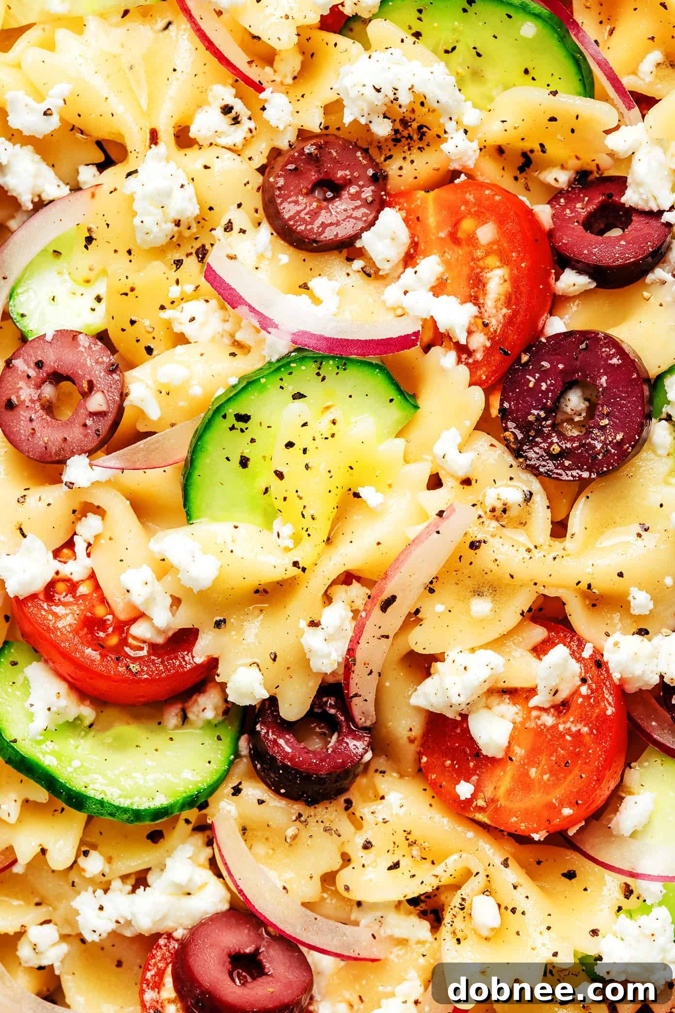 Sun-Drenched Mediterranean Pasta 5 A serving of Mediterranean Pasta Salad with fresh herbs