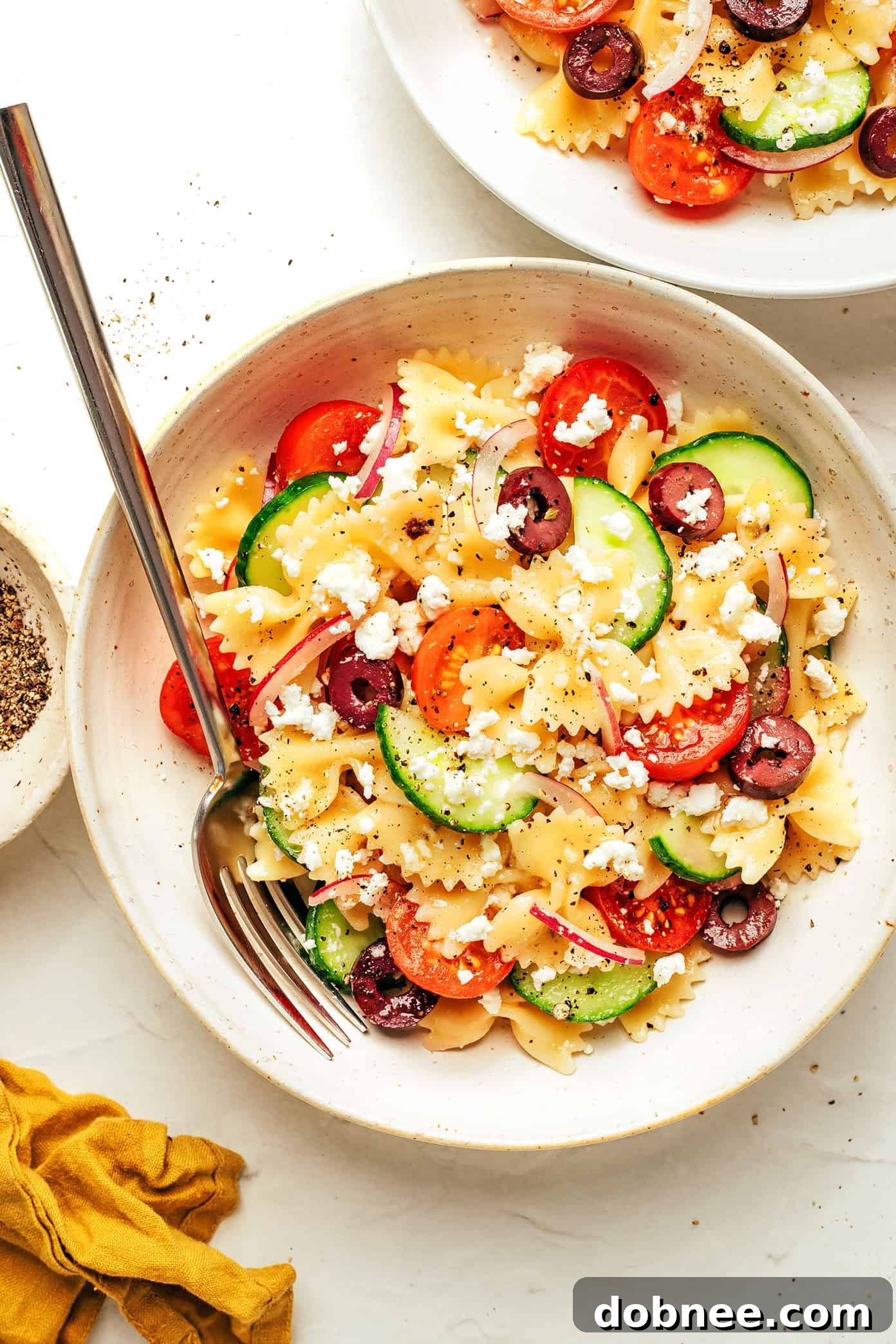 Sun-Drenched Mediterranean Pasta 6 Full spread of Mediterranean Pasta Salad in a bowl