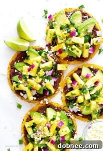 Stacked pineapple black bean tostadas with fresh ingredients