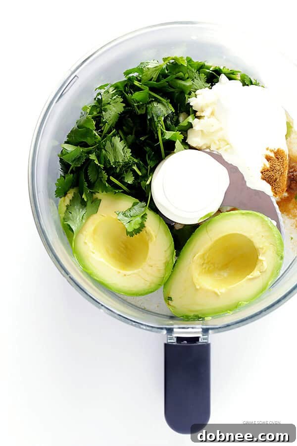 Fluffy tortillas filled with savory Brussels sprouts and a vibrant, creamy avocado sauce. Perfect for a quick and satisfying meal. | gimmesomeoven.com